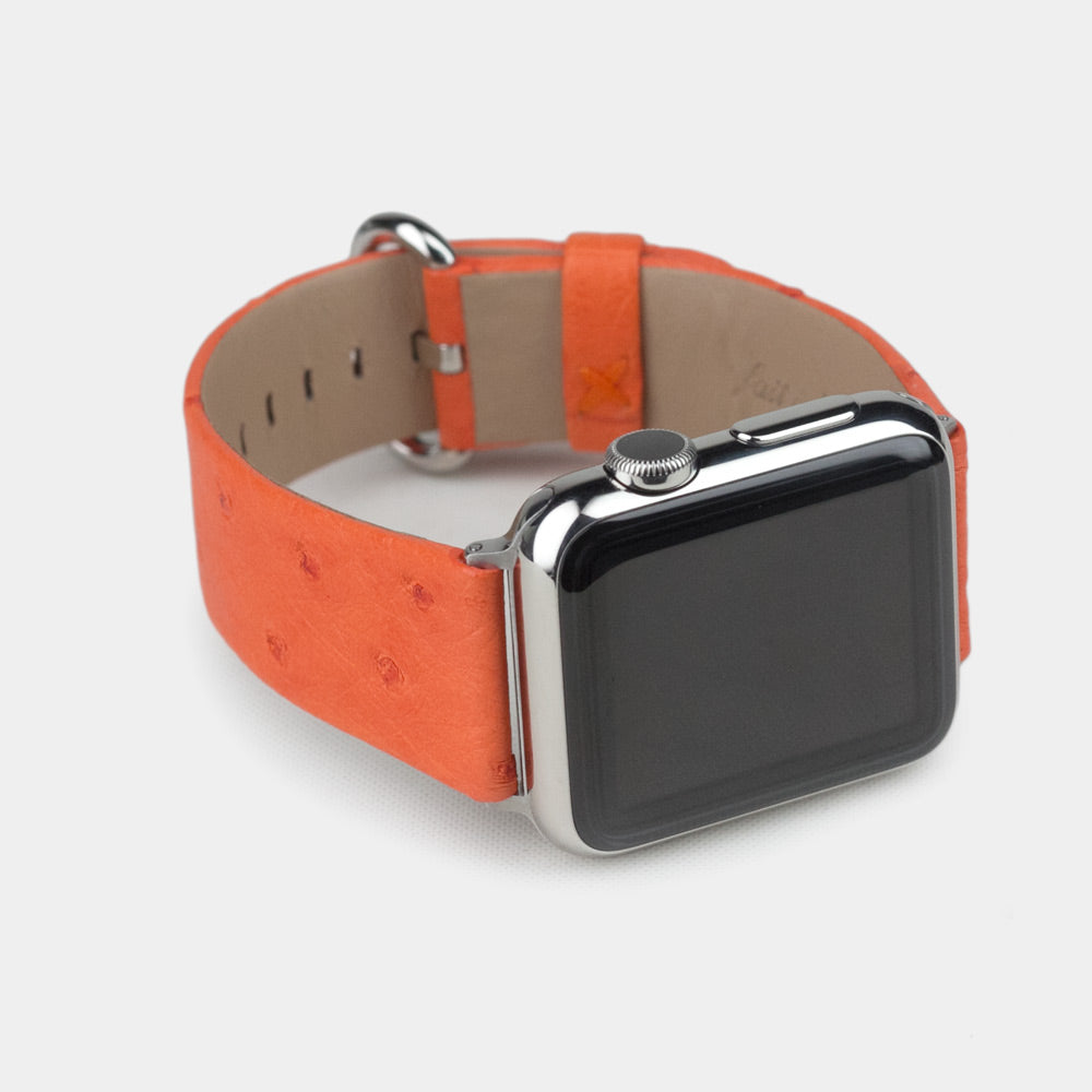 Strap for the Apple Watch 41/42 mm in orange ostrich leather, with steel adapters and buckle | close-up on the inner lining leather and the brand stamp