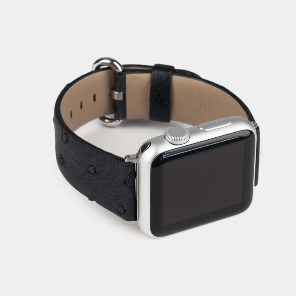 black ostrich strap apple watch with steel adapters and buckle frontal view