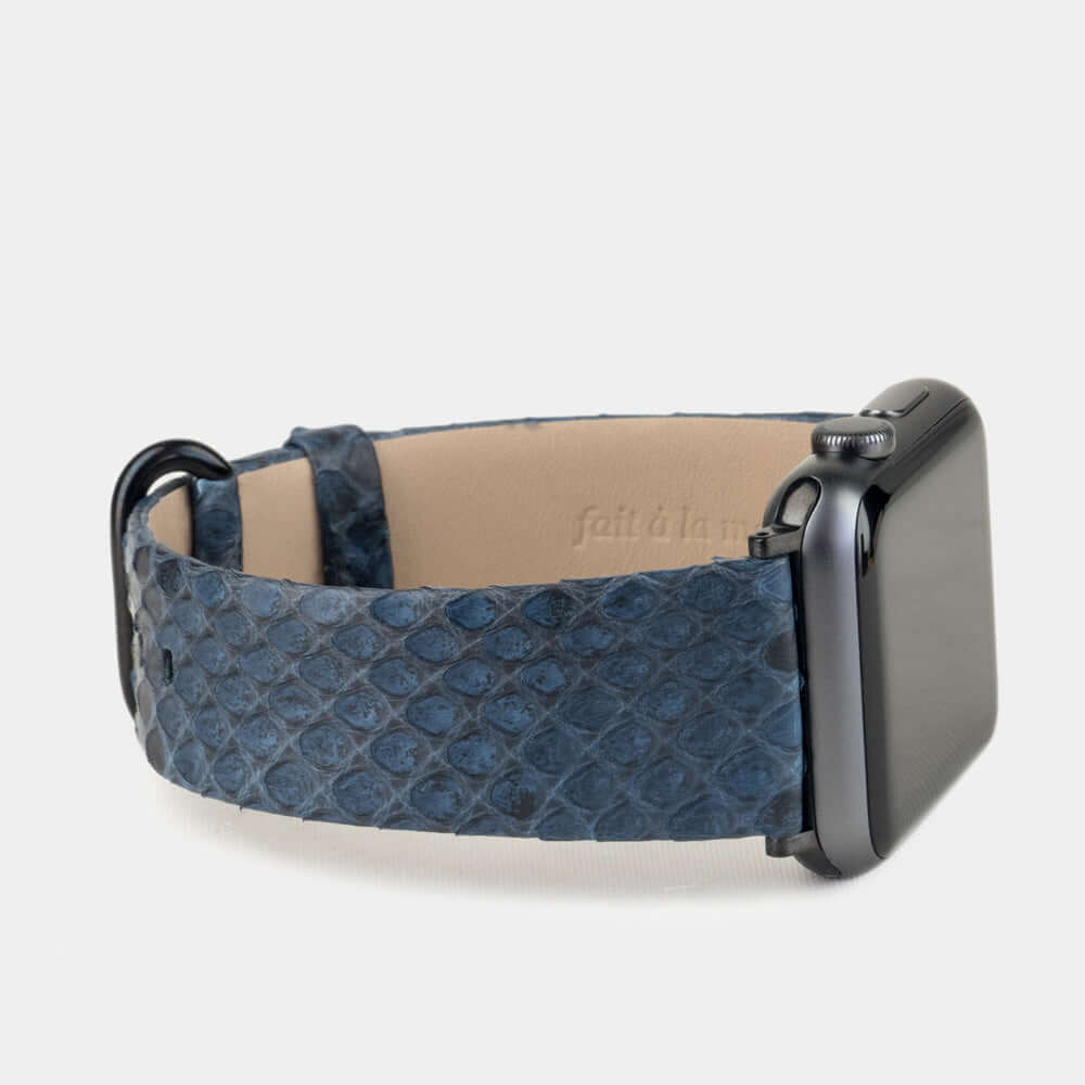 blue python strap apple watch with black adapters and buckle side view