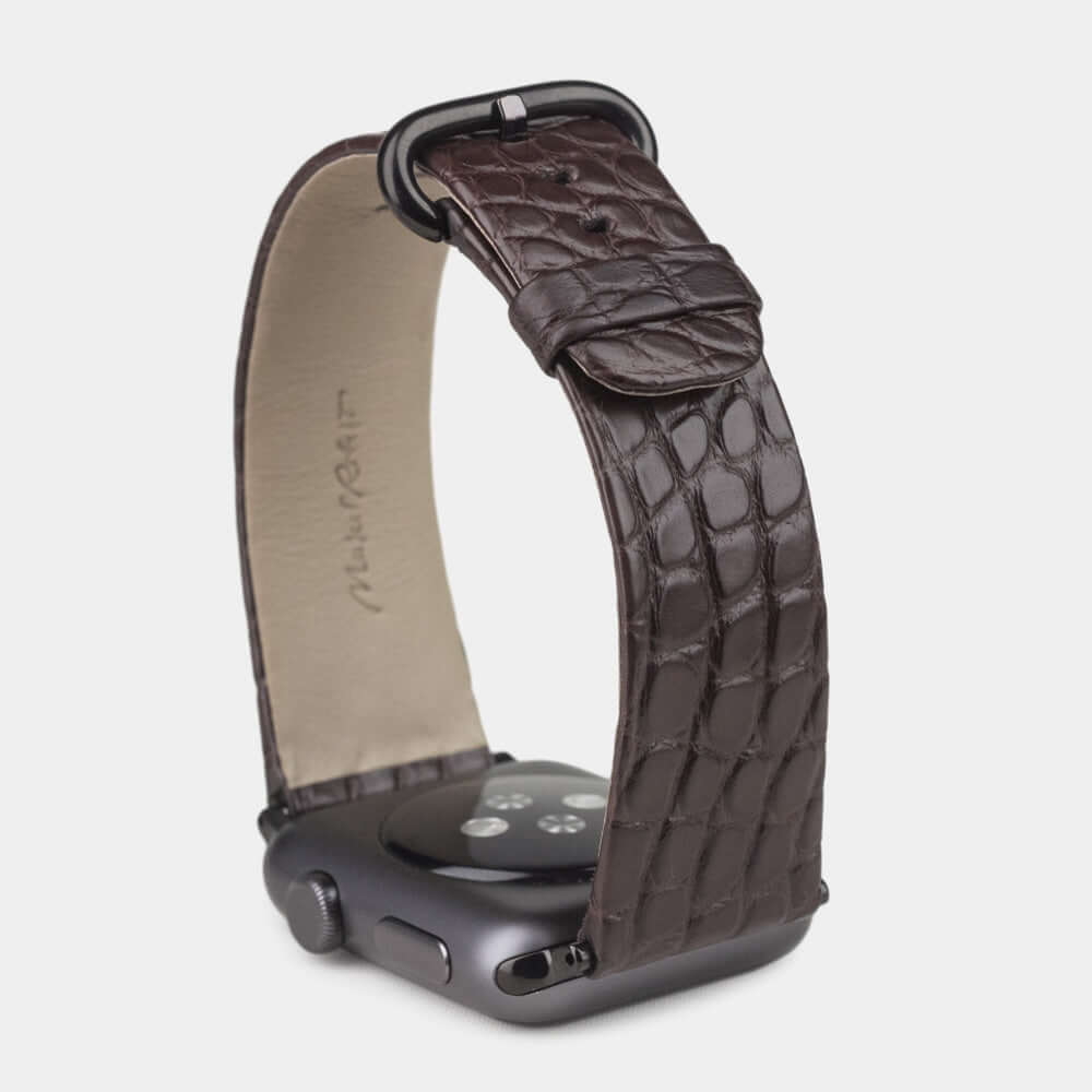 brown alligator band apple watch black adapters and buckle upper view
