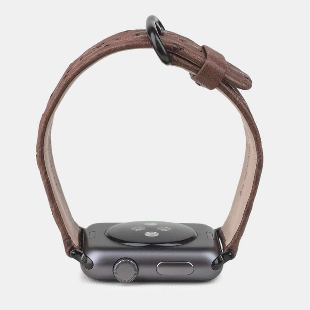 brown ostrich strap apple watch with black adapters & buckle profile view