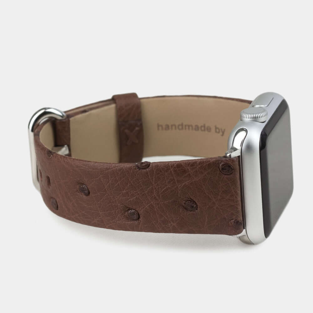 brown ostrich strap apple watch with steel adapters and buckle side view