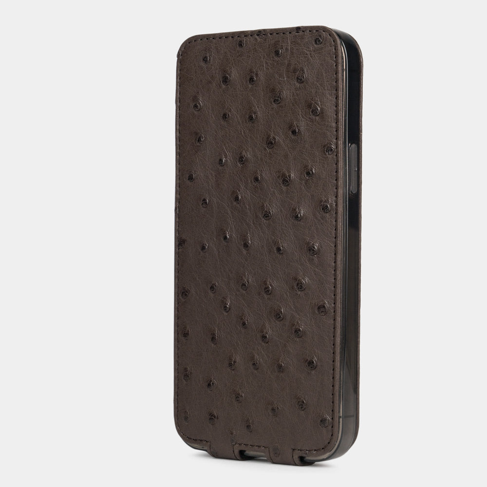 brown ostrich leather iphone 13 mini flip case in an upright position, cover closes securely thanks to its integrated magnet system
