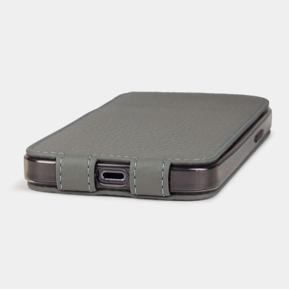 Grey Calfskin Case iPhone 15 - flat side view displaying ultra-thin handcrafted design, USB-C port opening and precise edge finishing