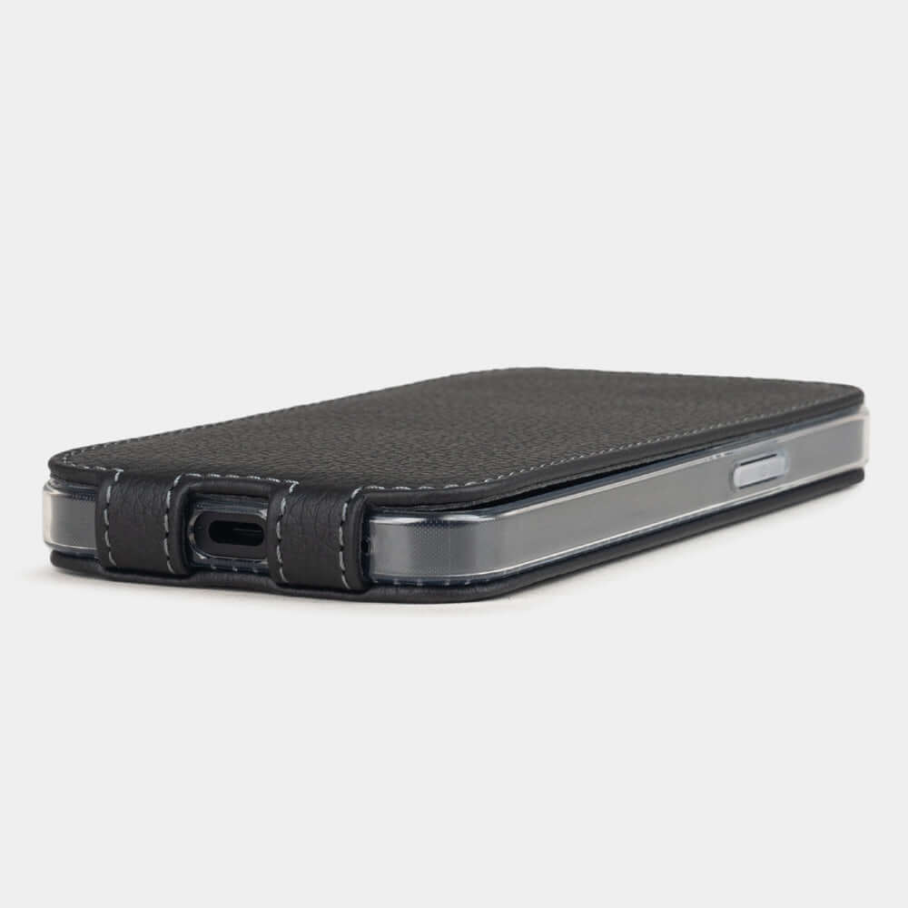 Black Calfskin Case iPhone 16 e - flat side view displaying ultra-thin handcrafted design, USB-C port opening and precise edge finishing
