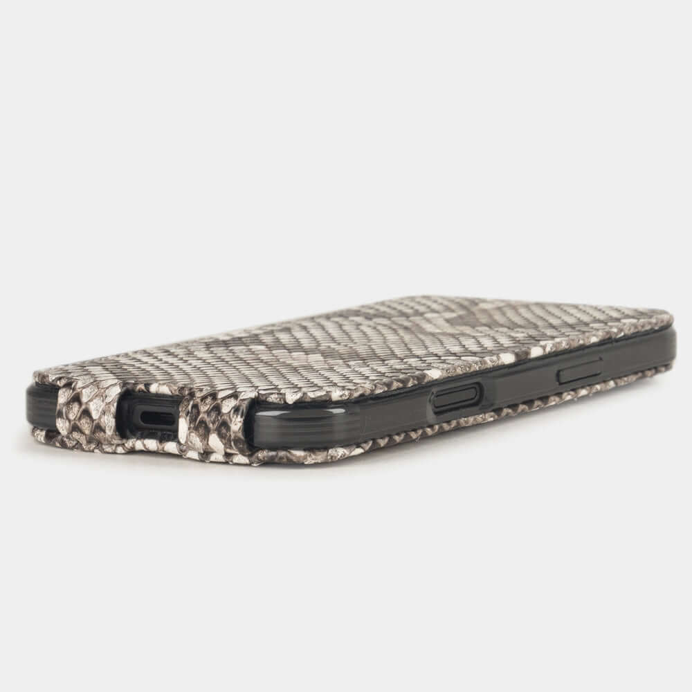 Natural Python Case iPhone 17 Air - flat side view displaying ultra-thin handcrafted design, USB-C port opening and precise edge finishing