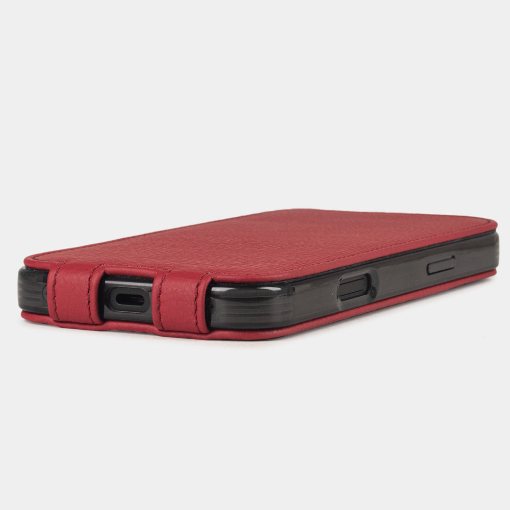 red leather flip case iPhone 17 - flat side view displaying ultra-thin handcrafted design, USB-C port opening and precise edge finishing