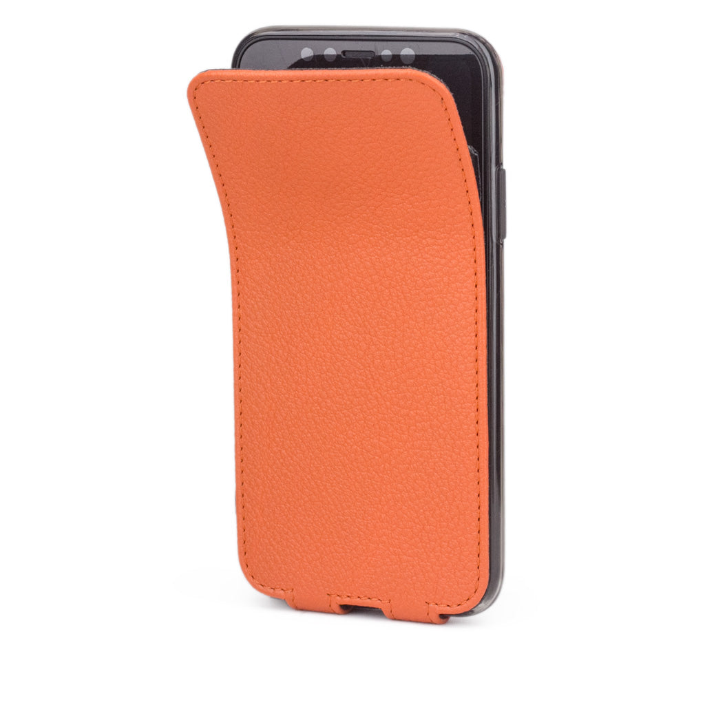 Orange leather flip case for iPhone X - side view showing the soft folding cover partially open
