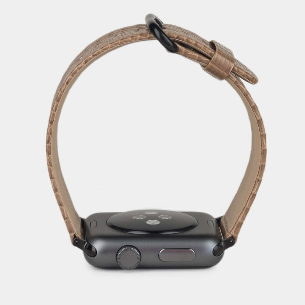 gold lizard strap apple watch black adapters and buckle profile view
