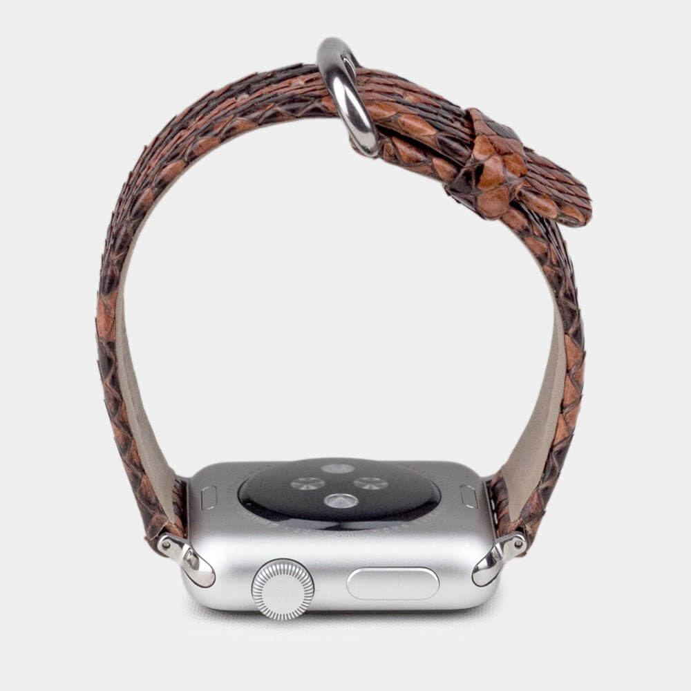 gold python strap apple watch with steel adapters and buckle profile view