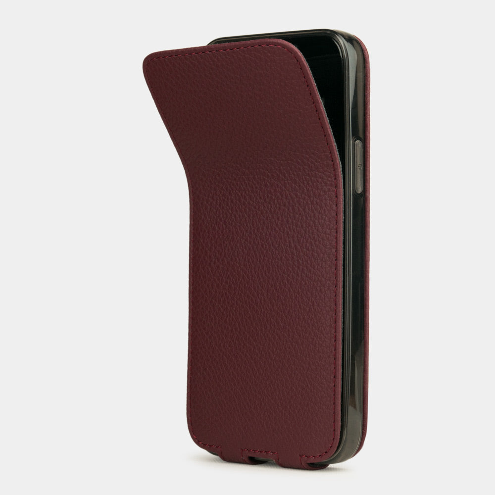 bordeaux leather iPhone 13 pro max flip case shown partially open, slim handcrafted leather cover with magnetic flap