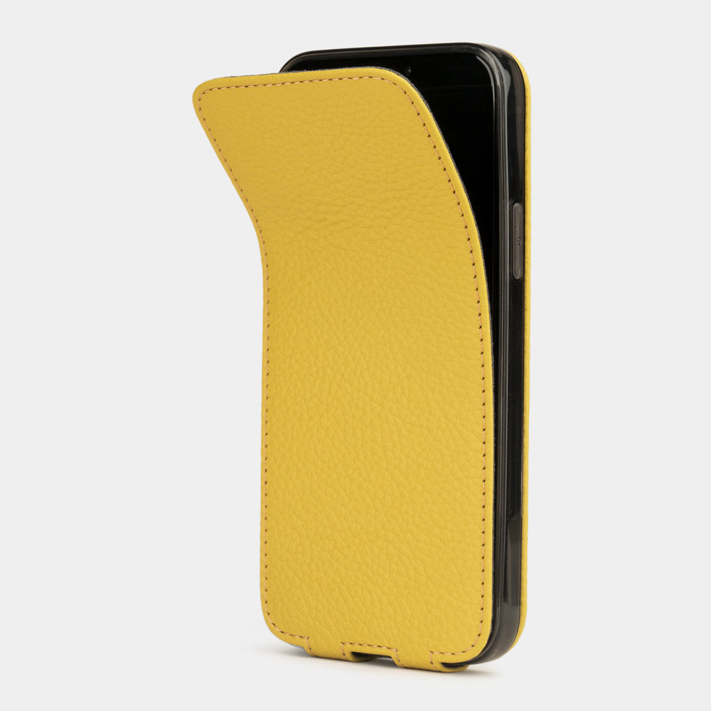 yellow leather iPhone 12 pro flip case shown partially open, slim handcrafted leather cover with magnetic flap