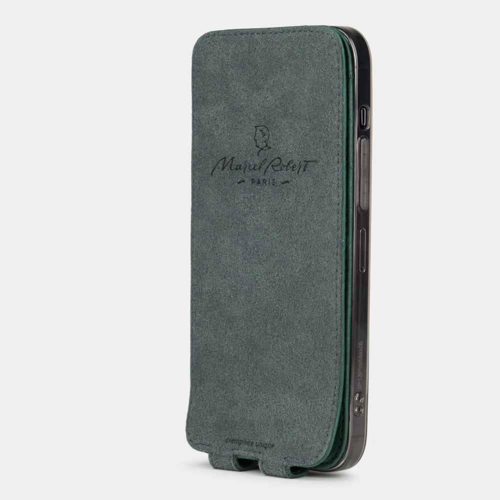 green ostrich leather flip case for iPhone 13 mini, vertical position, cover folded and secured to the back of the iPhone thanks to its integrated magnet system, revealing the grey microfibre lining