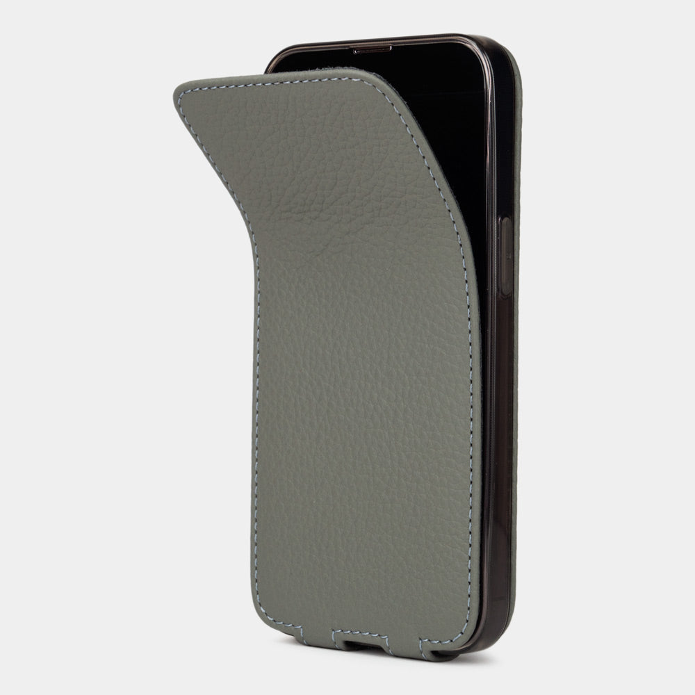 Grey calfskin leather flip case for iPhone 15 – magnetic flap opening to reveal the screen