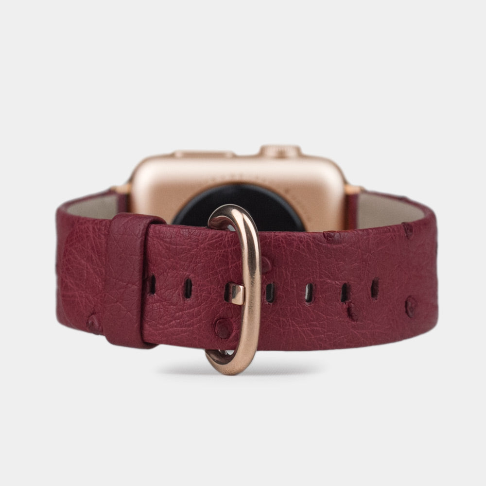 Strap for the Apple Watch 41/42 mm in fuchsia ostrich leather, with pink gold adapters and buckle | main view