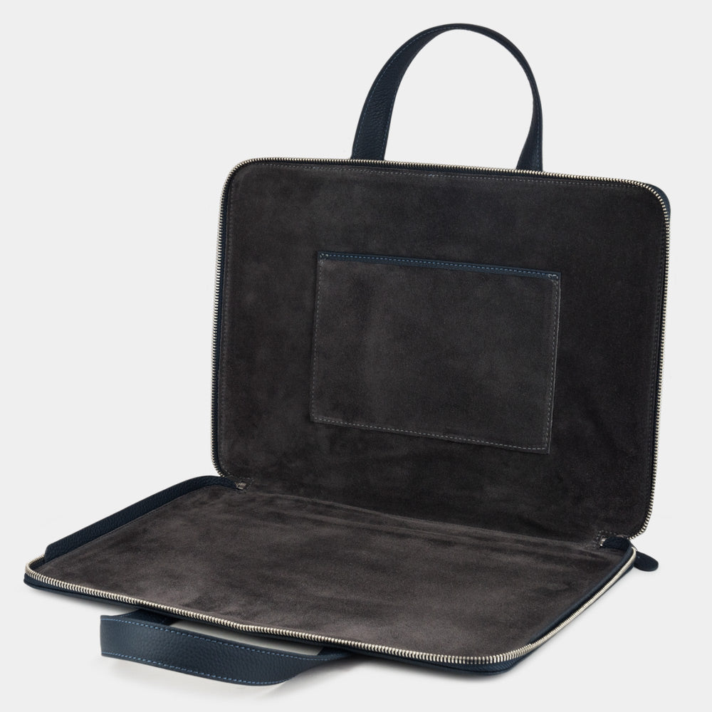 Men’s slim 17 inch black leather laptop bag open showing laptop compartment and suede lining