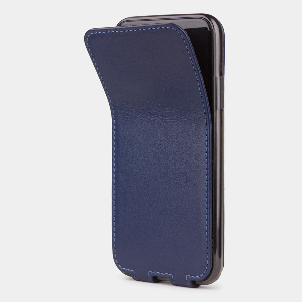 Blue Indigo leather flip case for iPhone X - side view showing the soft folding cover partially open