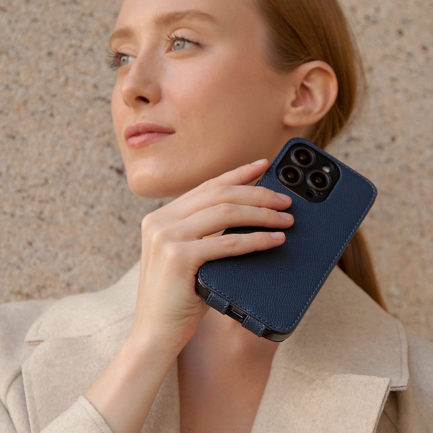 Blue Epsom leather case iPhone 15 Pro Max – front cover partially open, showing the magnetic flap mechanism