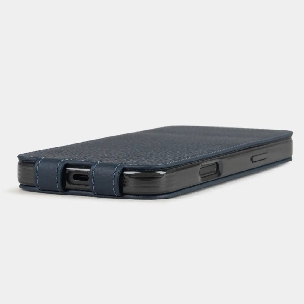 blue Calfskin leather case iPhone 17 Pro - flat side view displaying ultra-thin handcrafted design, USB-C port opening and precise edge finishing