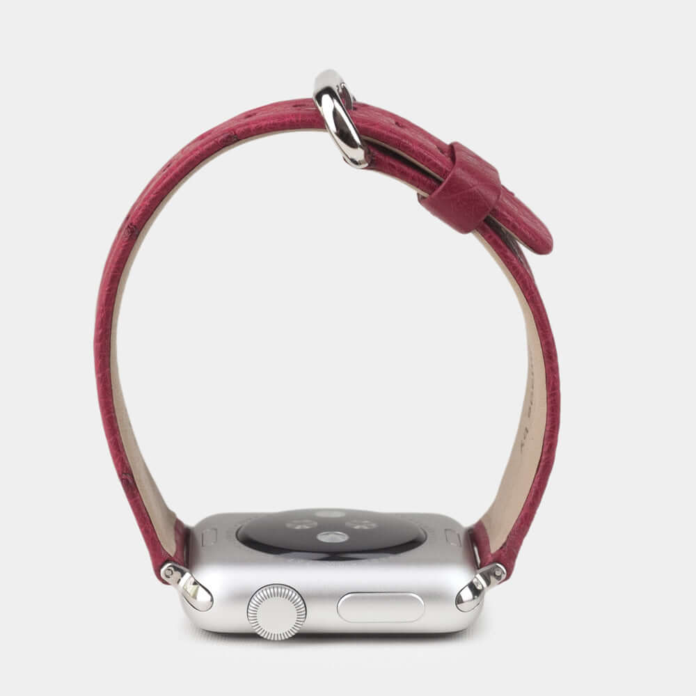 pink ostrich band apple watch steel adapters and buckle profile view
