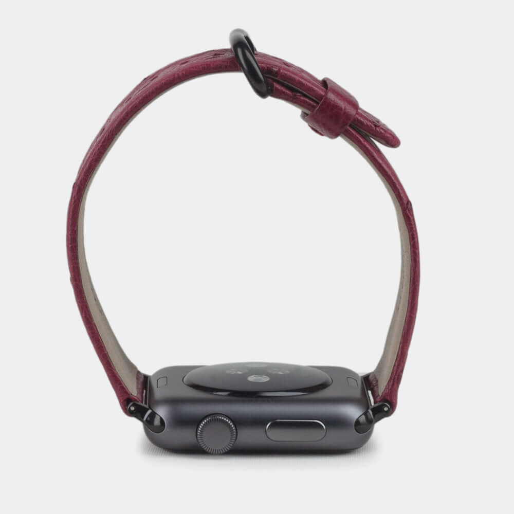 pink ostrich strap apple watch black adapters and buckle profile view