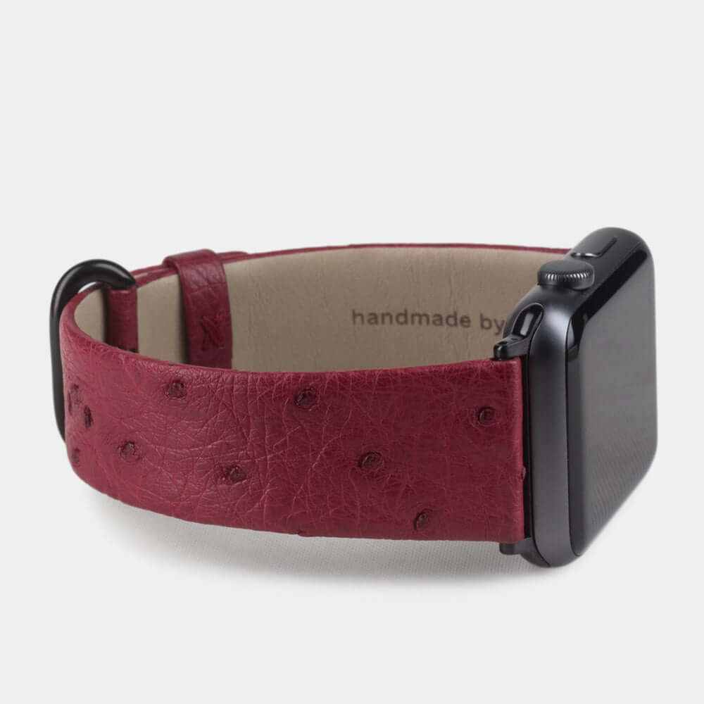 pink ostrich strap apple watch black adapters and buckle side view