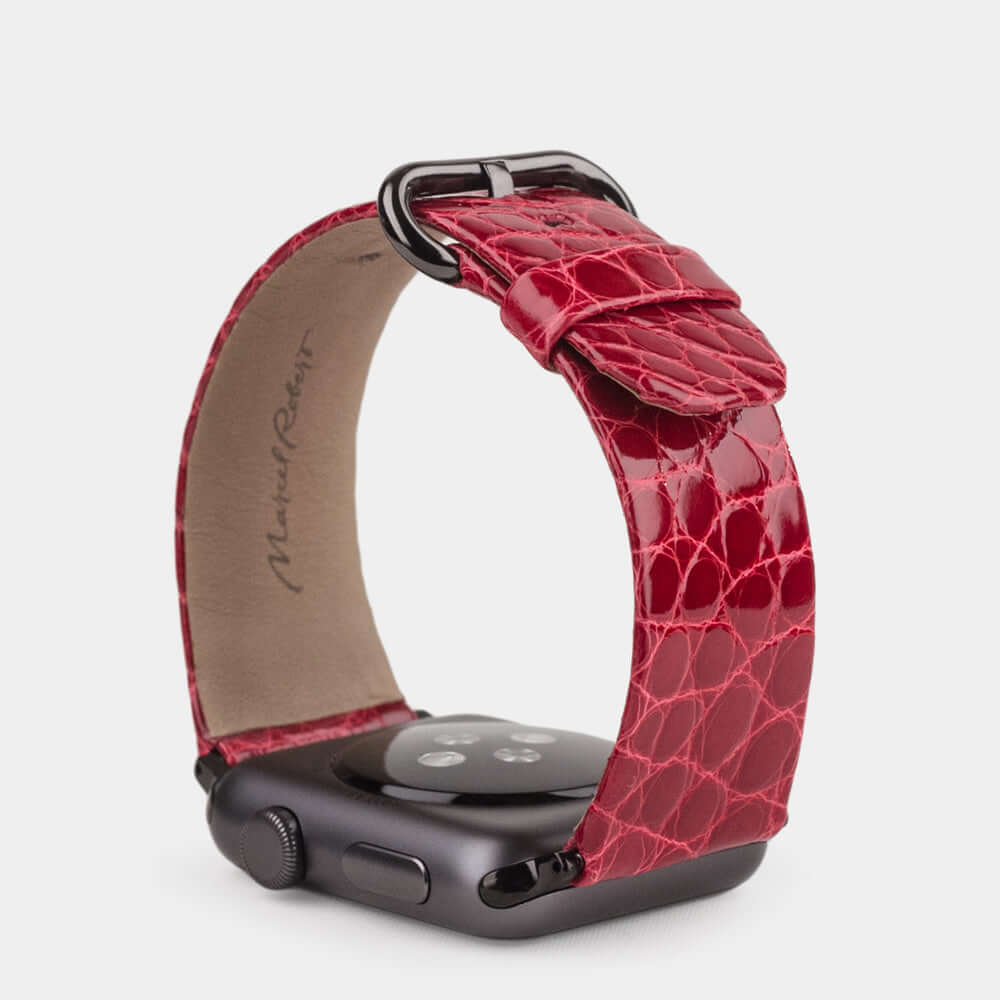red alligator strap apple watch black adapters and buckle upper view