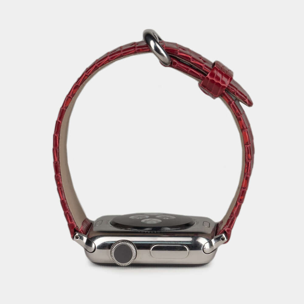 red lizard strap Apple Watch with steel adapters and buckle profile view