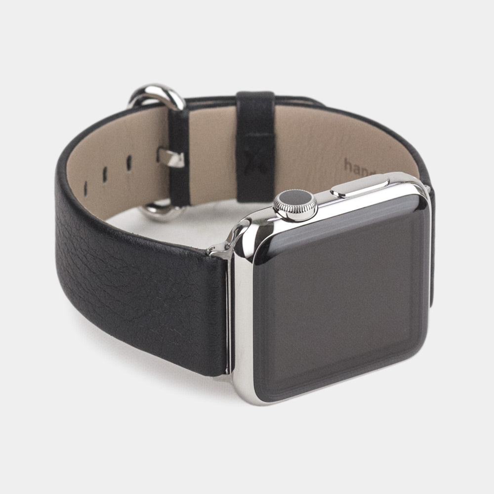 Cinturino per Apple Watch 45/46 mm in pelle di vitello liscia color nero, con adattatori e fibbia in acciaio | vista di 3/4 per vedere la pelle della fodera interna