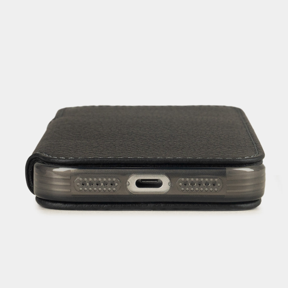 iPhone 17e & 16e calfskin folio wallet case black – flat view showing the slimness of the design, the USB-C port opening and a luxurious edge finish