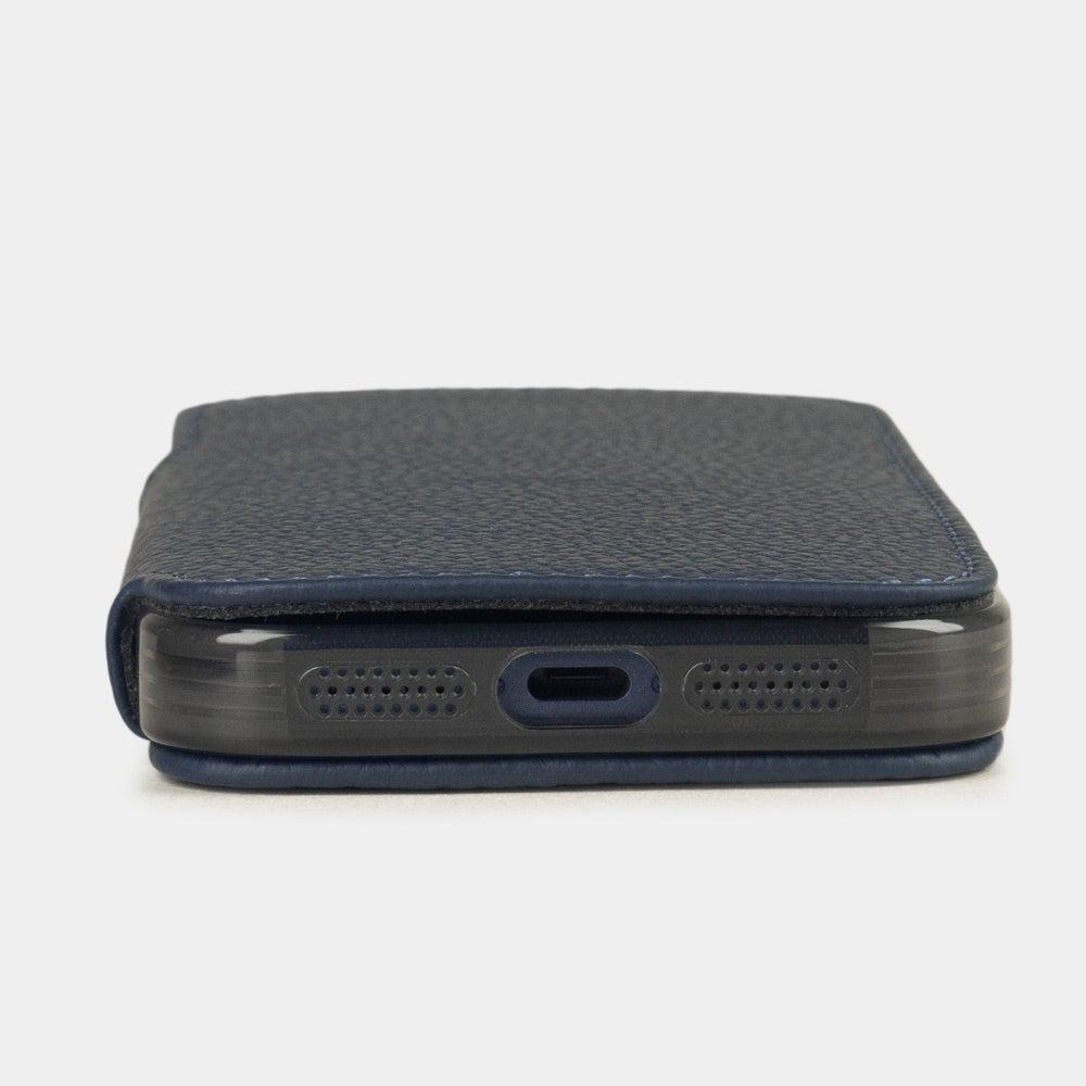 iPhone 17e & 16e calfskin folio wallet case blue – flat view showing the slimness of the design, the USB-C port opening and a luxurious edge finish
