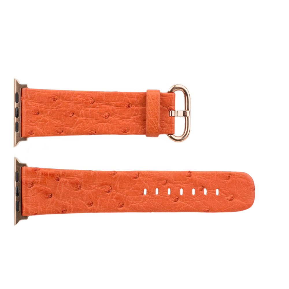 Strap for the Apple Watch 41/42 mm in orange ostrich leather, with pink gold adapters and buckle | flat lay view of the full strap to see its length