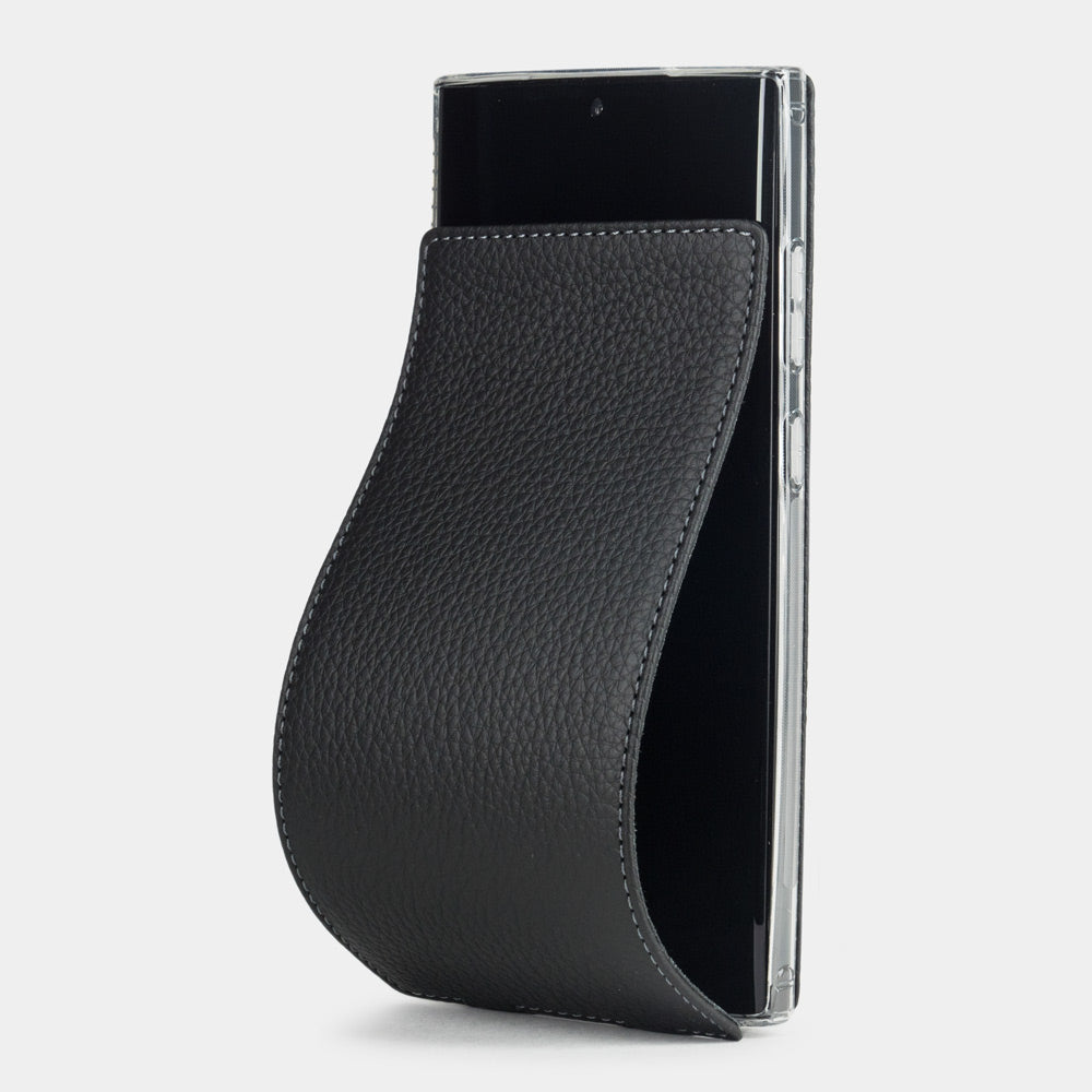 Funda de piel flip Samsung S23 Ultra negra, solapa magnética abriéndose para revelar la pantalla