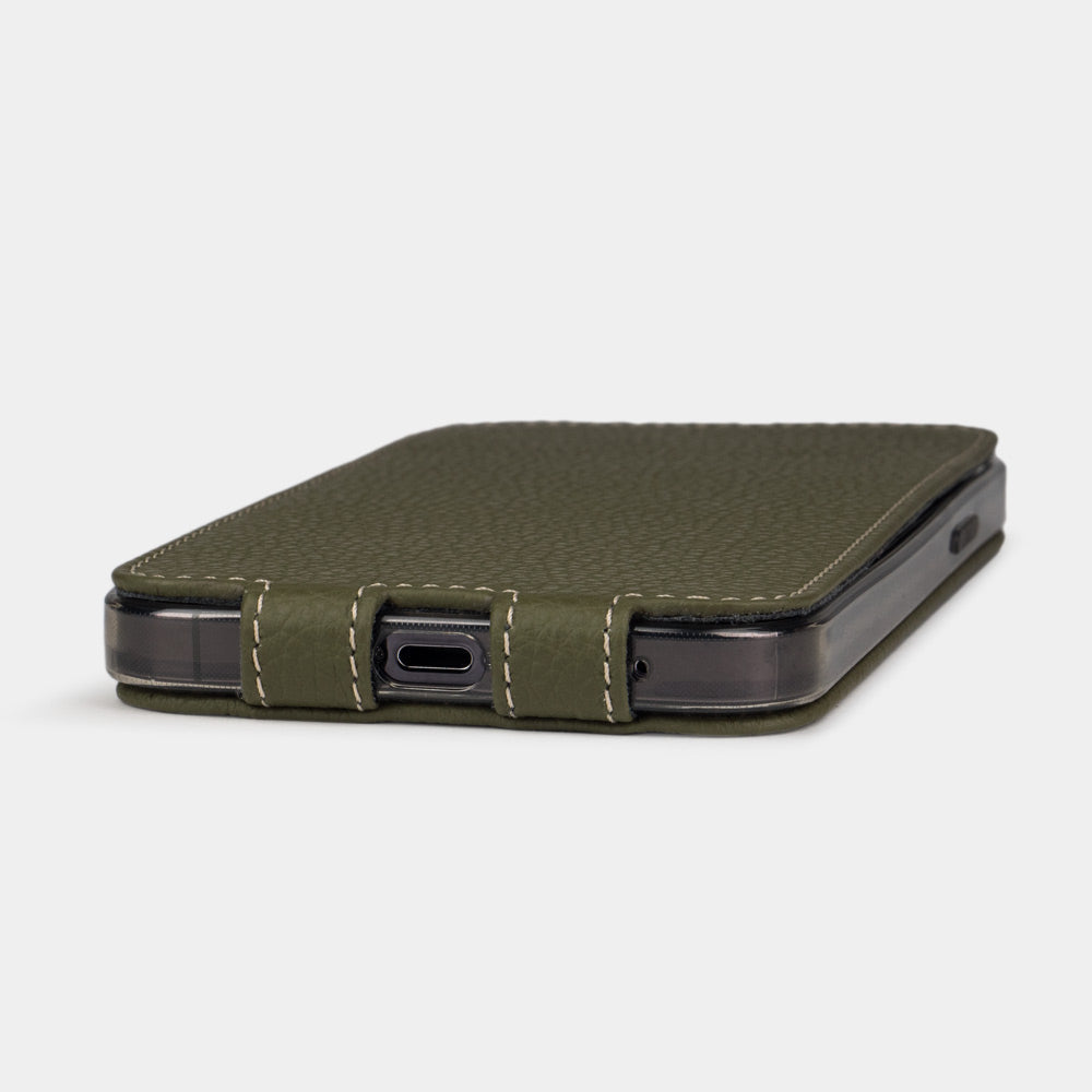 iPhone 14 Pro Max flip case made with green premium leather – the case laid flat, showing the precise charging-port cut-out and how slim it stays