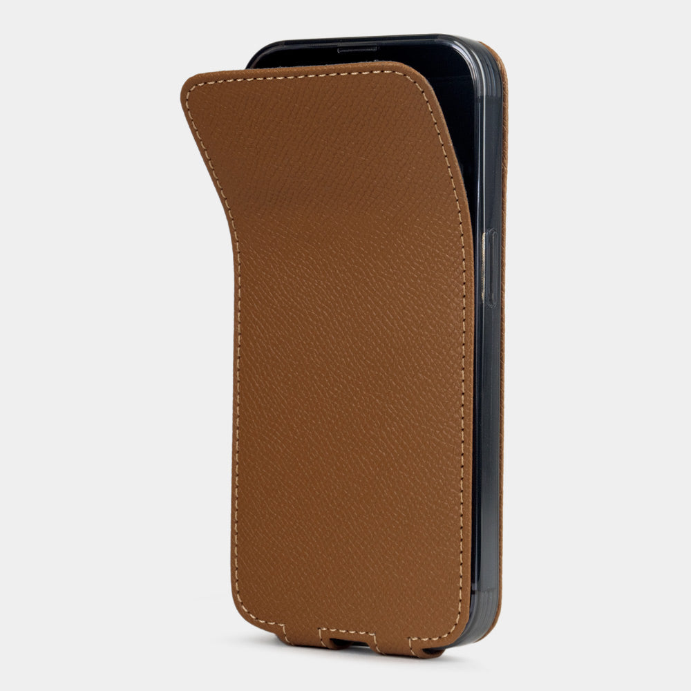 gold calfskin case iPhone 15 Pro – upright closed view highlighting the magnetic front cover fully protecting the screen, elegant silhouette