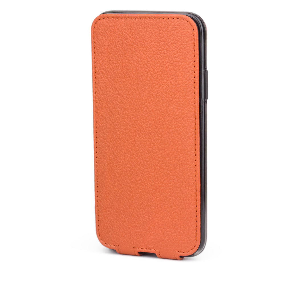 Orange leather flip case for iPhone X - upright closed view showing the front cover