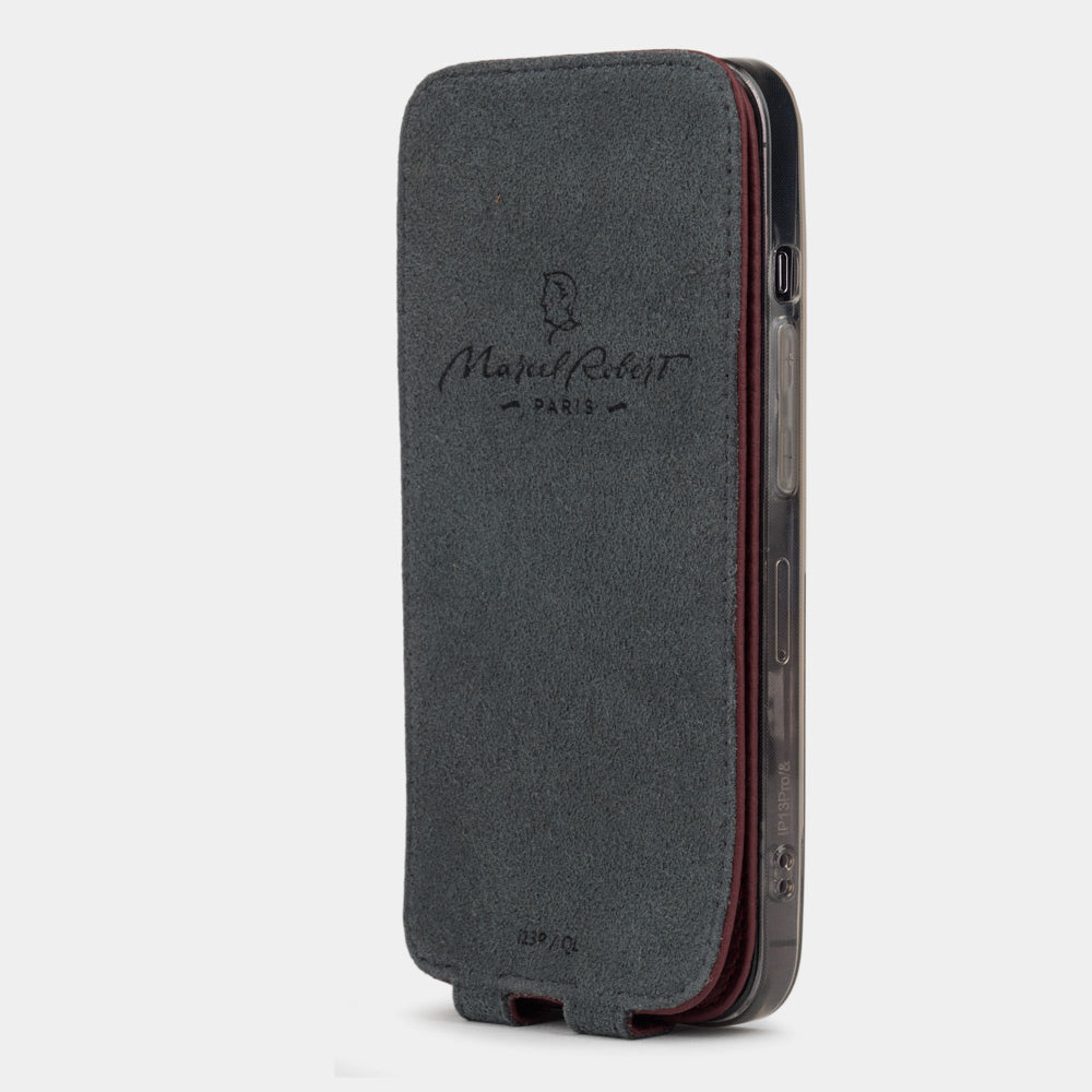 iPhone 14 Pro Max flip case made with bordeaux premium leather – flap folded onto the back of the iPhone, showing the Alcantara® fabric lining that cleans the screen