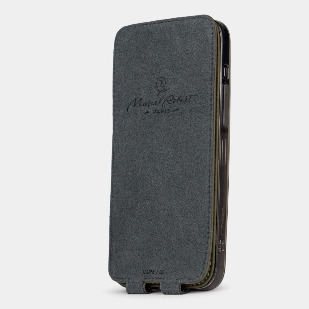 iPhone 14 flip case made with green premium leather – flap folded onto the back of the iPhone, showing the Alcantara® fabric lining that cleans the screen