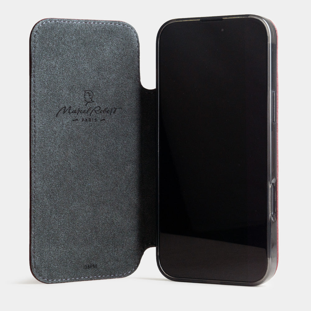 Open folio view of Marcel Robert iPhone 17 pro max folio case in bordeaux calfskin leather, grey Alcantara cover folded back and held with integrated magnets