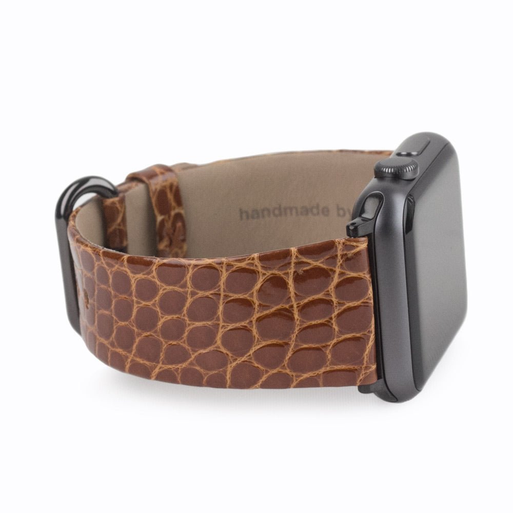 gold alligator strap apple watch black adapters and buckle side view