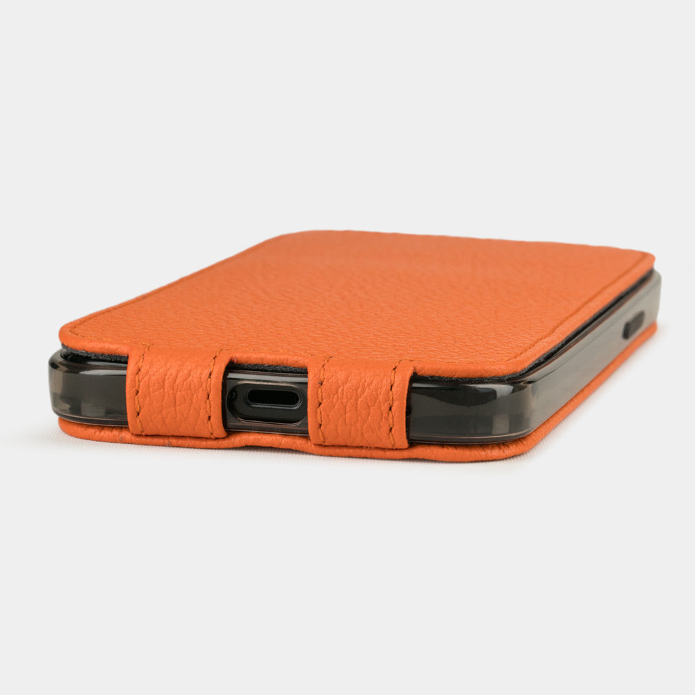 orange leather flip case for iPhone 12 pro max, view of the case laid flat showing its slim profile