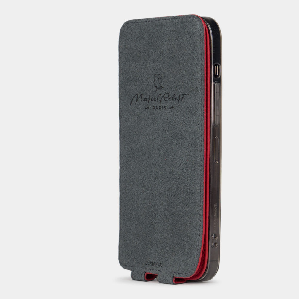 red leather flip case for iPhone 13 pro max, vertical position, cover folded and secured to the back of the iPhone thanks to its integrated magnet system, revealing the grey microfiber lining