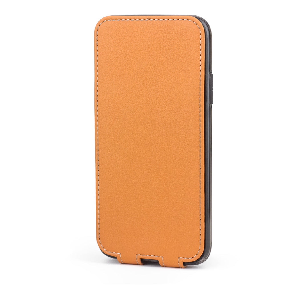 Ocre leather flip case for iPhone X - upright closed view showing the front cover