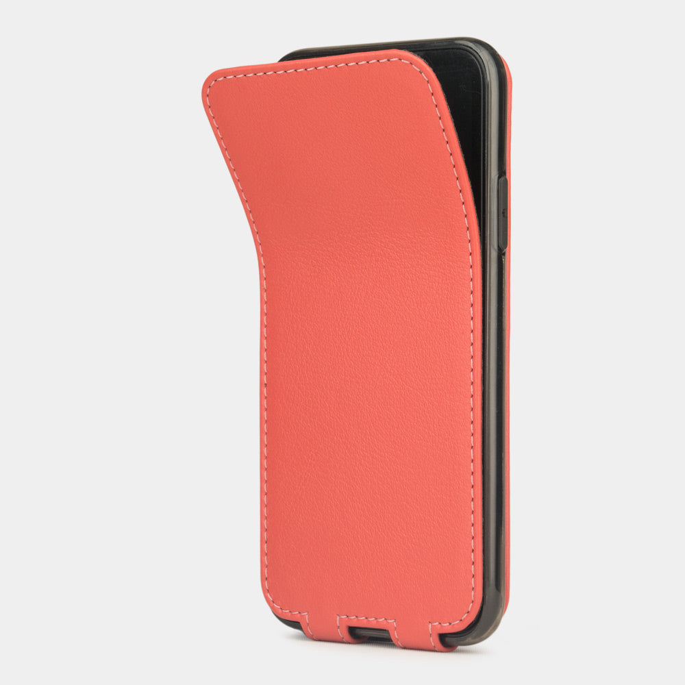 Red Coral leather flip case for iPhone X - side view showing the soft folding cover partially open