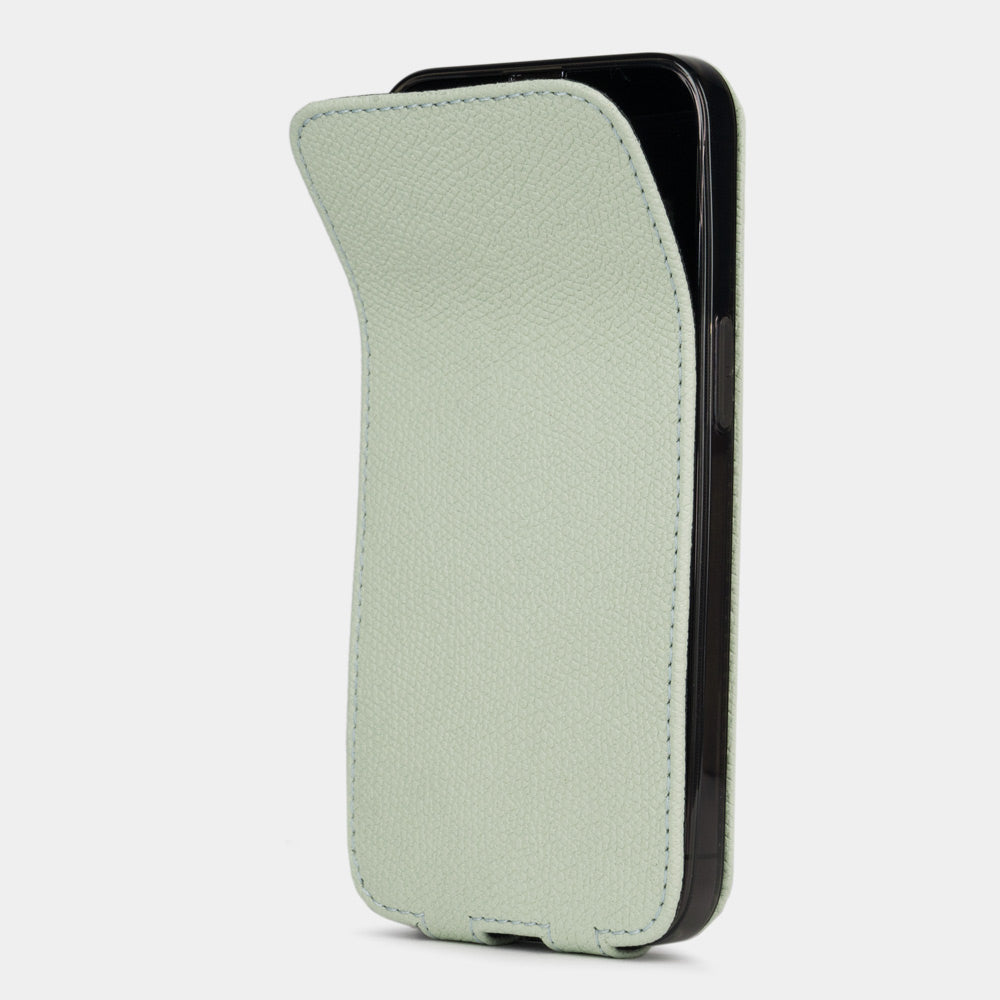Pastel green calfskin leather flip case for iPhone 15 – magnetic flap opening to reveal the screen