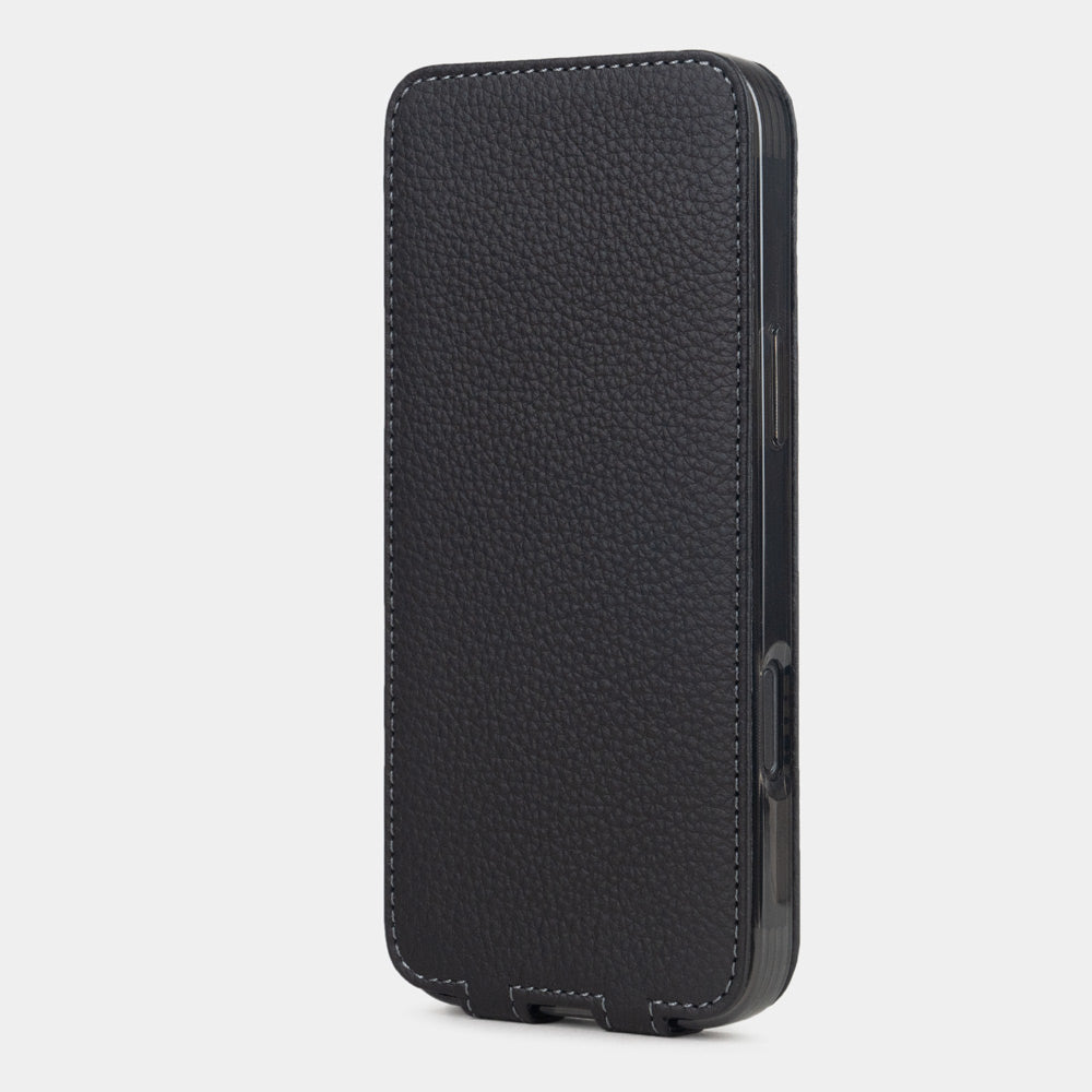 black leather flip case iPhone 17 – upright closed view highlighting the magnetic front cover fully protecting the screen, elegant silhouette