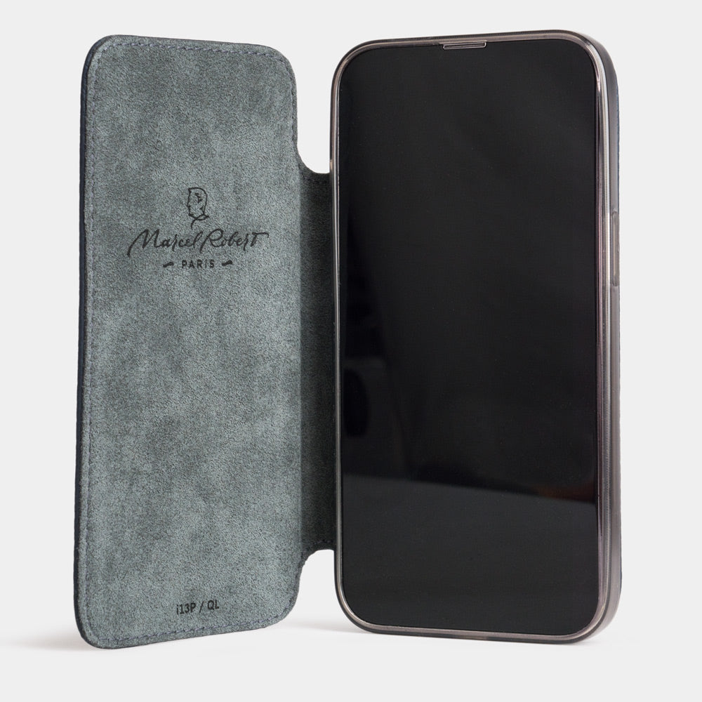 Blue calfskin leather folio case for iPhone 15 Pro – folio open, showing the Alcantara® lining and the screen