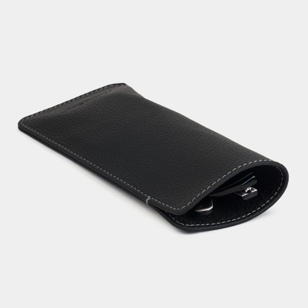 Black calfskin Pocket glasses pouch seen from the side, glasses inside
