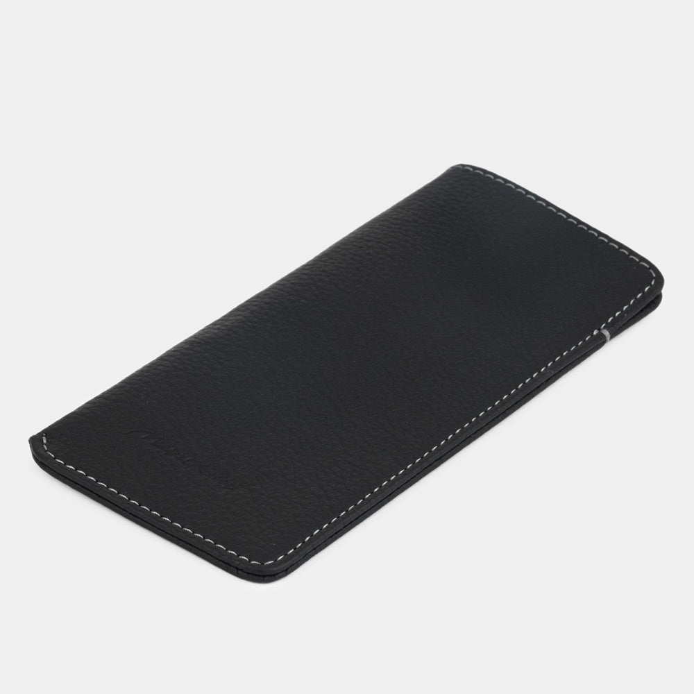 Black calfskin Pocket glasses pouch lying flat, three-quarter view