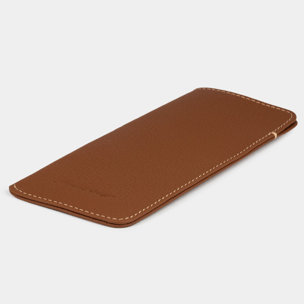Gold calfskin Pocket glasses pouch lying flat, three-quarter view